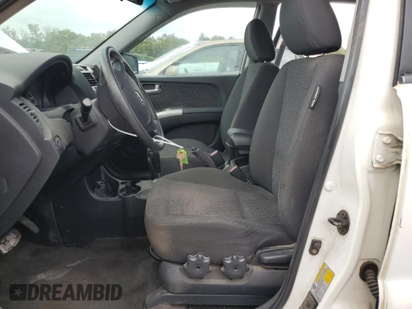 2005 Kia Sportage LX with VIN KNDJF723557078730, listed as a Copart auction lot 79823504 with 166,509 mi miles and Salvage Title. Bid and sale history available at carsss.com. Image 7.