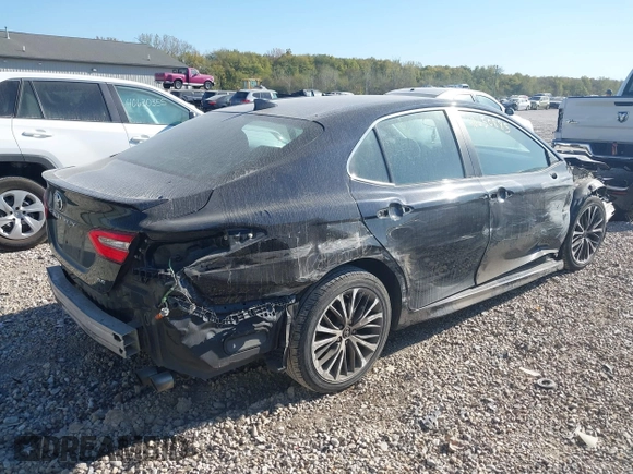 2019 Toyota Camry LE z VIN 4T1B11HK1KU686574, wystawiony jako IAAI lot #40650885 z przebiegiem 112 269 mil mil oraz . Historia ofert i sprzedaży dostępna na DreamBid. Obrazek 4.