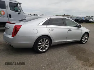 2014 Cadillac XTS Luxury with VIN 2G61M5S31E9217117, listed as a Copart auction lot 49659075 with 104,988 mi miles and Salvage Title. Bid and sale history available at DreamBid. Image 3.