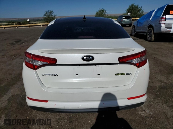 2013 Kia Optima Hybrid EX with VIN KNAGM4ADXD5060028, listed as a Copart auction lot 69083304 with 119,701 mi miles and Salvage Title. Bid and sale history available at carsss.com. Image 6.