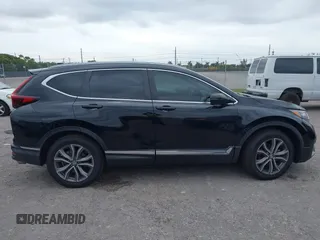2021 Honda CR-V Touring with VIN 2HKRW1H91MH410751, listed as a IAAI auction lot 41286168 with 56,314 mi miles. Bid and sale history available at carsss.com. Image 13.