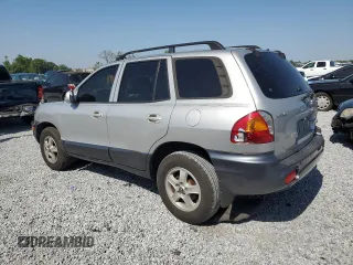 2003 Hyundai Santa Fe GLS z VIN KM8SC13D23U370587, wystawiony jako Copart lot #52775885 z przebiegiem Nie podano mil oraz Szkoda całkowita • Salvage title. Historia ofert i sprzedaży dostępna na DreamBid. Obrazek 2.