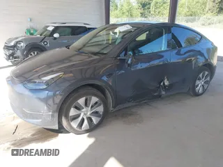 2023 Tesla Model Y Long Range with VIN 7SAYGAEE4PF906577, listed as a IAAI auction lot 42174987 with 13,260 mi miles and . Bid and sale history available at DreamBid. Image 17.