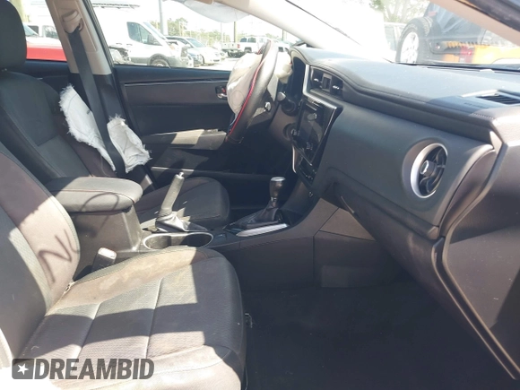 2019 Toyota Corolla L with VIN 5YFBURHE7KP878972, listed as a IAAI auction lot 42000888 with 201,612 mi miles. Bid and sale history available at carsss.com. Image 5.