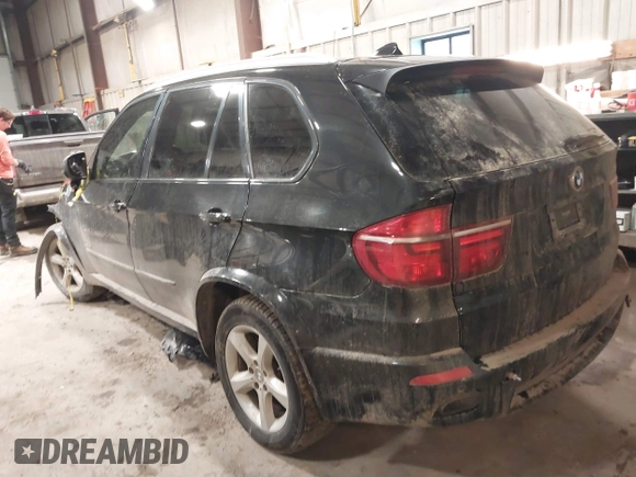 2012 BMW X5 35i with VIN 5UXZV4C50CL757568, listed as a IAAI auction lot 41315024 with 166,825 mi miles and . Bid and sale history available at DreamBid. Image 3.