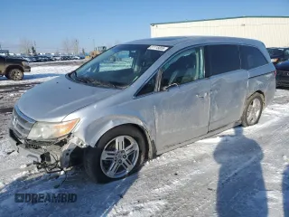 2011 Honda Odyssey Touring with VIN 5FNRL5H98BB506159, listed as a Copart auction lot 51115055 with 210,781 mi miles and Salvage title. Bid and sale history available at DreamBid. Image 1.