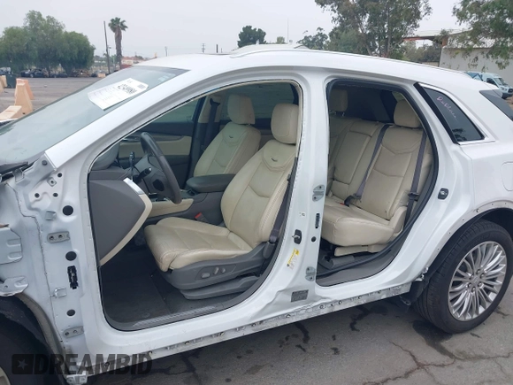 2017 Cadillac XT5 Premium Luxury FWD with VIN 1GYKNCRS4HZ128145, listed as a IAAI auction lot 42349980 with 99,100 mi miles and . Bid and sale history available at DreamBid. Image 6.