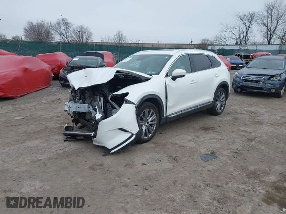 2021 Mazda CX-9 Signature with VIN JM3TCBEY0M0510960, listed as a IAAI auction lot 41334221 with 44,388 mi miles. Bid and sale history available at carsss.com. Image 2.