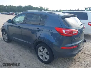 2012 Kia Sportage LX with VIN KNDPB3A27C7320227, listed as a IAAI auction lot 42109588 with 162,043 mi miles. Bid and sale history available at carsss.com. Image 3.