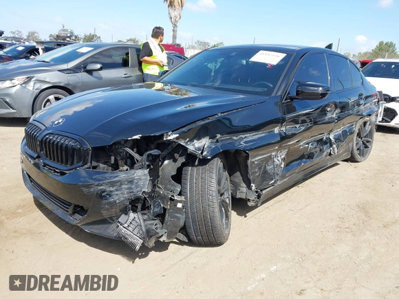 2023 BMW 3 Series 330i with VIN 3MW69FF03P8D45563, listed as a IAAI auction lot 41932536 with 19,496 mi miles and . Bid and sale history available at DreamBid. Image 2.
