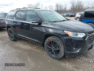 2019 Chevrolet Traverse Premier with VIN 1GNEVKKW0KJ242005, listed as a IAAI auction lot 41941476 with 105,759 mi miles and . Bid and sale history available at DreamBid. Image 1.