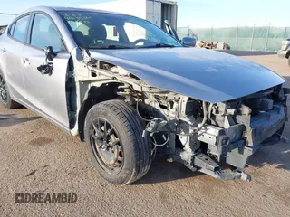 2015 Mazda 3 i Sport with VIN 3MZBM1U74FM214972, listed as a IAAI auction lot 41639561 with 157,597 mi miles. Bid and sale history available at carsss.com. Image 6.