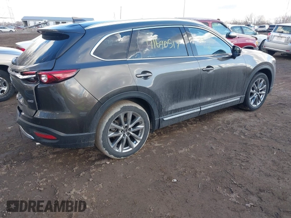 2019 Mazda CX-9 Grand Touring with VIN JM3TCBDY3K0331505, listed as a IAAI auction lot 41690517 with 64,520 mi miles. Bid and sale history available at carsss.com. Image 4.