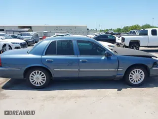 2009 Mercury Grand Marquis LS with VIN 2MEHM75V09X634393, listed as a IAAI auction lot 41993456 with 153,862 mi miles. Bid and sale history available at carsss.com. Image 13.