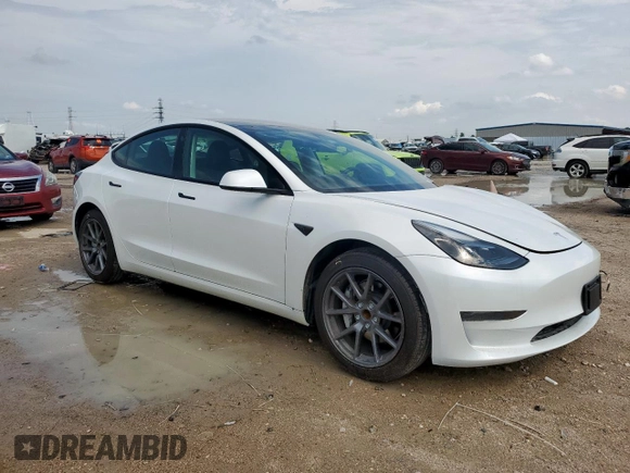 2023 Tesla Model 3 with VIN 5YJ3E1EA1PF550454, listed as a Copart auction lot 58985695 with 19,199 mi miles and Salvage title. Bid and sale history available at DreamBid. Image 4.
