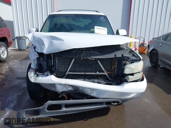 2003 GMC Yukon SLT with VIN 1GKEK13V23J300767, listed as a IAAI auction lot 41691632 with 251,849 mi miles. Bid and sale history available at carsss.com. Image 12.