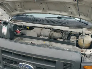 2010 Ford Econoline Cargo Commercial z VIN 1FTNE2EL1ADA99282, wystawiony jako IAAI lot #42604073 z przebiegiem 128 942 mil mil oraz . Historia ofert i sprzedaży dostępna na DreamBid. Obrazek 12.