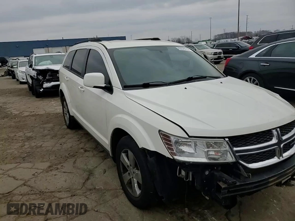 2012 Dodge Journey SXT with VIN 3C4PDCBG0CT331294, listed as a Copart auction lot 52066075 with 216,470 mi miles and Clean title. Bid and sale history available at DreamBid. Image 11.