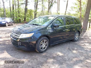 2013 Honda Odyssey EX-L with VIN 5FNRL5H69DB025040, listed as a IAAI auction lot 42078699 with 181,470 mi miles and . Bid and sale history available at carsss.com. Image 2.