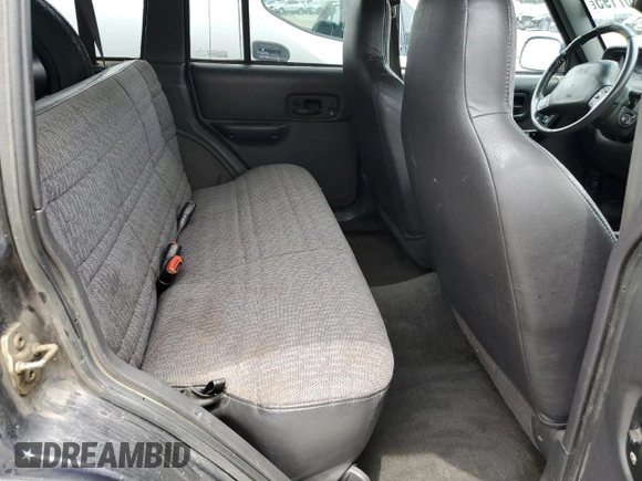 1999 Jeep Cherokee Sport с VIN 1J4FT68S6XL586023, выставлен на аукционе Copart как лот 58907195 с пробегом 391 932 миль миль и Списание • Salvage title. История ставок и продаж доступна на DreamBid. Изображение 11.