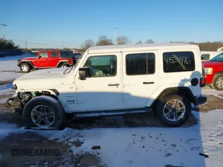 2021 Jeep Wrangler Unlimited Sahara with VIN 1C4HJXEG2MW827385, listed as a IAAI auction lot 41534476 with 29,489 mi miles and . Bid and sale history available at DreamBid. Image 14.