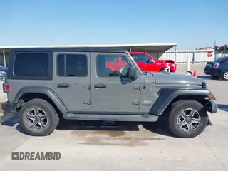 2020 Jeep Wrangler Unlimited Sport S with VIN 1C4HJXDN9LW223055, listed as a IAAI auction lot 41975355 with 61,349 mi miles and . Bid and sale history available at DreamBid. Image 14.