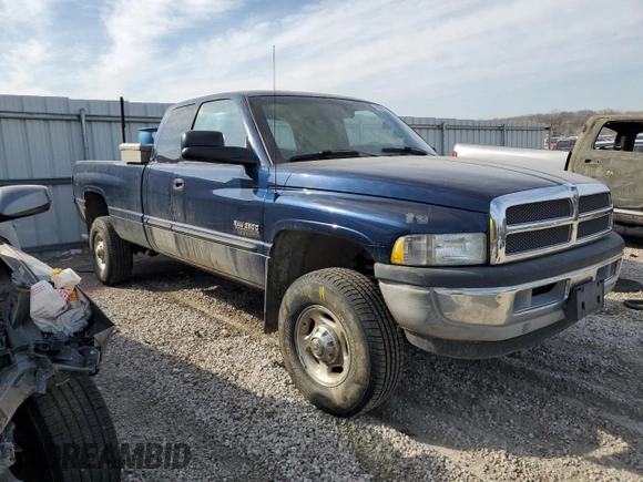 2000 Dodge 2500 with VIN 3B7KF2362YG132087, listed as a Copart auction lot 48668925 with 358,326 mi miles and Salvage title. Bid and sale history available at DreamBid. Image 4.