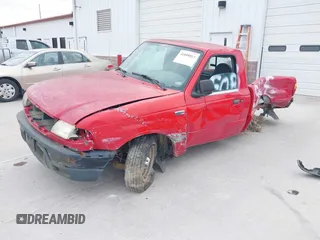 2003 Mazda B-Series Truck SX with VIN 4F4YR12D03TM14307, listed as a IAAI auction lot 41808811 with 153,476 mi miles and . Bid and sale history available at DreamBid. Image 2.