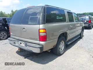 2003 Chevrolet Suburban LT with VIN 1GNFK16Z73J112624, listed as a IAAI auction lot 42759406 with 152,556 mi miles and . Bid and sale history available at DreamBid. Image 4.
