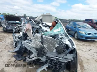 2023 Mazda CX-50 Premium z VIN 7MMVABDY7PN138825, wystawiony jako IAAI lot #42214751 z przebiegiem Nie podano mil oraz . Historia ofert i sprzedaży dostępna na DreamBid. Obrazek 11.