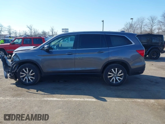 2021 Honda Pilot EX-L with VIN 5FNYF6H54MB028203, listed as a IAAI auction lot 41641116 with 46,755 mi miles and . Bid and sale history available at DreamBid. Image 14.