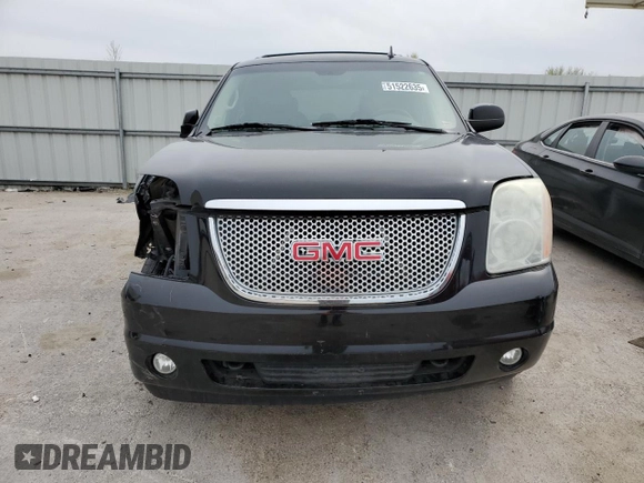 2009 GMC Yukon SLT 4SB with VIN 1GKFK33009R280856, listed as a Copart auction lot 51522635 with 265,941 mi miles and Salvage Title. Bid and sale history available at DreamBid. Image 5.