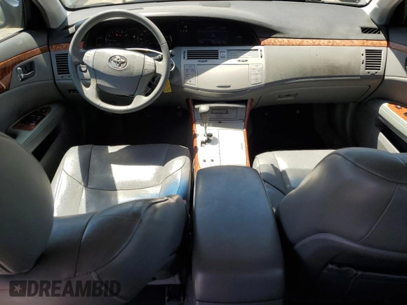 2007 Toyota Avalon XL z VIN 4T1BK36B37U221068, wystawiony jako Copart lot #58092985 z przebiegiem 168 743 mil mil oraz Szkoda całkowita • Salvage title. Historia ofert i sprzedaży dostępna na DreamBid. Obrazek 8.