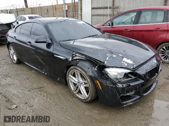 2014 BMW 6 Series 650i z VIN WBA6B2C5XED128959, wystawiony jako Copart lot #44201745 z przebiegiem 146 875 mil mil oraz Szkoda całkowita • Salvage title. Historia ofert i sprzedaży dostępna na DreamBid. Obrazek 4.
