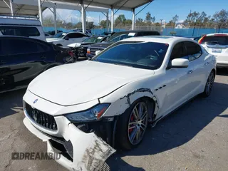 2015 Maserati Ghibli z VIN ZAM57XSA8F1161212, wystawiony jako IAAI lot #41746084 z przebiegiem 57 169 mil mil oraz . Historia ofert i sprzedaży dostępna na DreamBid. Obrazek 17.
