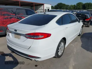 2018 Ford Fusion S z VIN 3FA6P0G76JR109403, wystawiony jako IAAI lot #42231625 z przebiegiem 109 018 mil mil oraz . Historia ofert i sprzedaży dostępna na DreamBid. Obrazek 4.