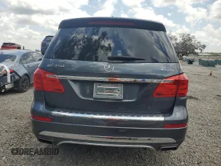 2014 Mercedes-Benz GL 450 z VIN 4JGDF7CE0EA303471, wystawiony jako Copart lot #58673045 z przebiegiem 182 455 mil mil oraz Tytuł czysty. Historia ofert i sprzedaży dostępna na DreamBid. Obrazek 6.
