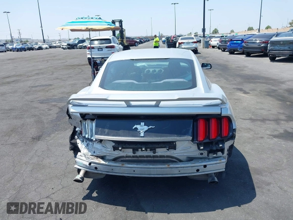 2015 Ford Mustang V6 with VIN 1FA6P8AM1F5342967, listed as a IAAI auction lot 42164817 with 106,700 mi miles and . Bid and sale history available at DreamBid. Image 17.
