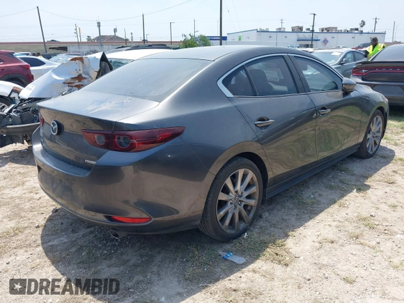 2021 Mazda 3 Preferred with VIN JM1BPACL1M1317639, listed as a IAAI auction lot 41939340 with 51,195 mi miles and . Bid and sale history available at DreamBid. Image 4.