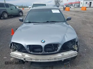 2003 BMW 3 Series 330i with VIN WBAEV53463KM04252, listed as a IAAI auction lot 42006945 with 193,387 mi miles. Bid and sale history available at carsss.com. Image 6.