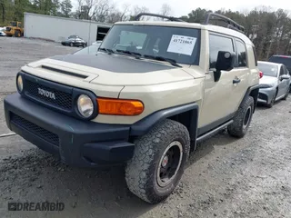2010 Toyota FJ Cruiser with VIN JTEBU4BF1AK095319, listed as a IAAI auction lot 41721065 with 126,262 mi miles. Bid and sale history available at carsss.com. Image 2.