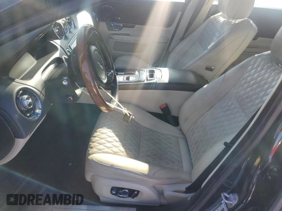 2016 Jaguar XJ Portfolio with VIN SAJWA2G78G8V94534, listed as a Copart auction lot 86926944 with 144,093 mi miles and Salvage title. Bid and sale history available at DreamBid. Image 7.