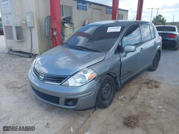 2011 Nissan Versa 1.8 SL with VIN 3N1BC1CP7BL446671, listed as a IAAI auction lot 42003858 with 96,939 mi miles. Bid and sale history available at carsss.com. Image 2.