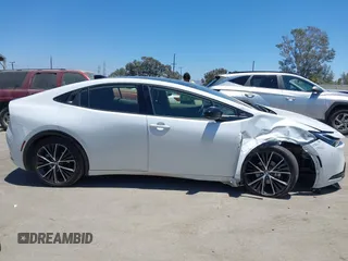 2024 Toyota Prius LE with VIN JTDACAAU2R3020703, listed as a IAAI auction lot 42644240 with 32,715 mi miles and . Bid and sale history available at DreamBid. Image 13.