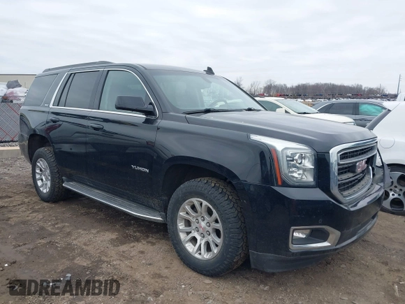 2016 GMC Yukon SLE with VIN 1GKS2AKC2GR357481, listed as a IAAI auction lot 41715909 with 165,377 mi miles. Bid and sale history available at carsss.com. Image 1.