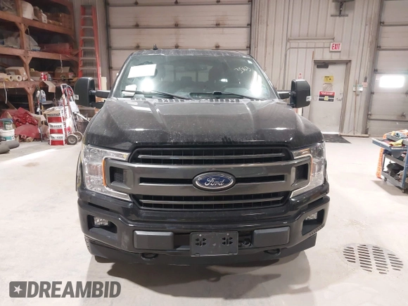 2018 Ford F-150 XL with VIN 1FTFW1E56JFD06640, listed as a IAAI auction lot 41983563 with 63,092 mi miles. Bid and sale history available at carsss.com. Image 12.