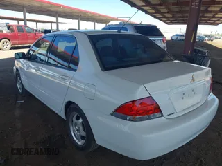 2004 Mitsubishi Lancer ES with VIN JA3AJ26E14U065498, listed as a IAAI auction lot 41887945 with 142,632 mi miles. Bid and sale history available at carsss.com. Image 3.
