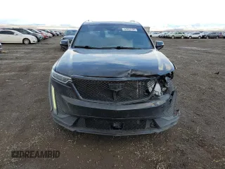2021 Cadillac XT6 AWD Sport z VIN 1GYKPHRSXMZ164181, wystawiony jako Copart lot #84267124 z przebiegiem 70 658 mil mil oraz Szkody całkowita. Historia ofert i sprzedaży dostępna na DreamBid. Obrazek 5.