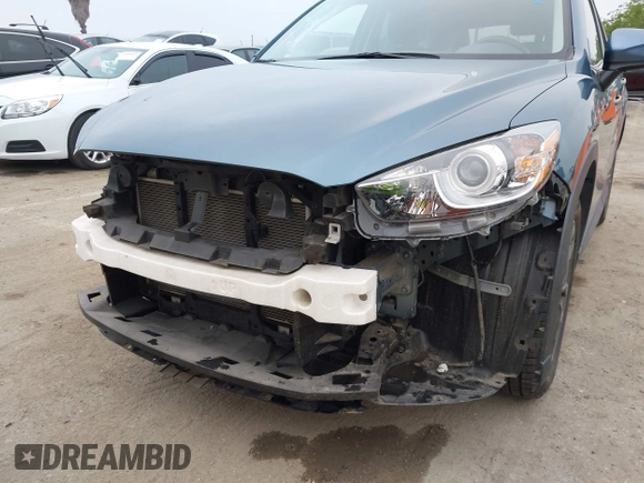 2016 Mazda CX-5 Grand Touring with VIN JM3KE2DY7G0875678, listed as a IAAI auction lot 42104888 with 30,566 mi miles. Bid and sale history available at carsss.com. Image 18.