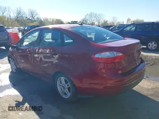 2017 Ford Fiesta SE z VIN 3FADP4BJ6HM143379, wystawiony jako IAAI lot #40863748 z przebiegiem 77 325 mil mil oraz . Historia ofert i sprzedaży dostępna na DreamBid. Obrazek 3.